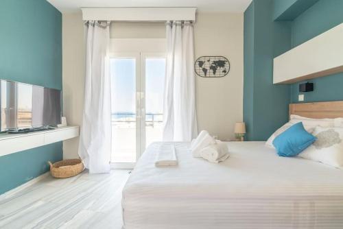 Posteľ alebo postele v izbe v ubytovaní Penthouse Studio in Centre with SeaView