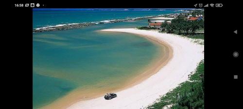 an aerial view of a beach and the ocean at CASA Praia Barra de Tabatinga NATAL RN in Nísia Floresta