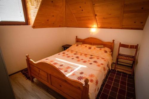 Postel nebo postele na pokoji v ubytování Apartmani Vidra