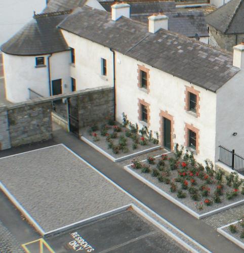 an aerial view of a building with flowers in a courtyard at Castletown Round House in Celbridge