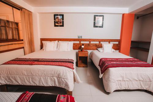 Ένα ή περισσότερα κρεβάτια σε δωμάτιο στο Dreams House Cusco