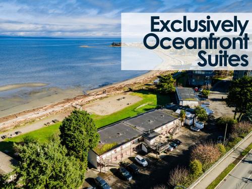 an aerial view of a beach and the ocean at Sea Edge Motel in Parksville