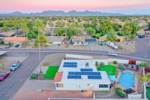 an aerial view of a house with solar panels on it at Premier Host Villa-Heated Pool, Golf, Mayo Clinic in Phoenix