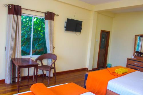 Postel nebo postele na pokoji v ubytování Hotel Olinka