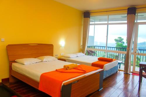 Postel nebo postele na pokoji v ubytování Hotel Olinka