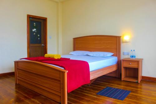 Postel nebo postele na pokoji v ubytování Hotel Olinka