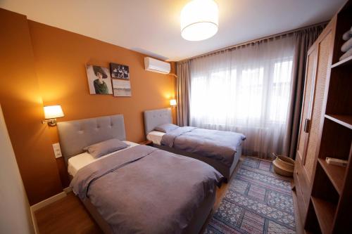 Postel nebo postele na pokoji v ubytování NEW Modern Flat- by Taksim Square
