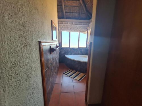 Kupaonica u objektu Hornbill Private Lodge Mabalingwe