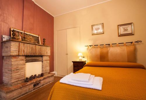 En eller flere senger på et rom på Dimora Antica Pianella