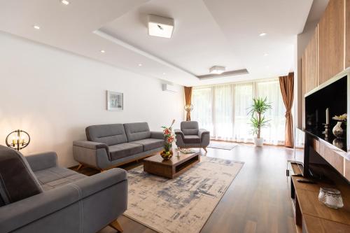 TV a/nebo společenská místnost v ubytování Malak Resort Sarajevo