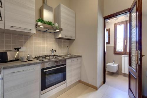 Woodie Apartment by Mamo Florence