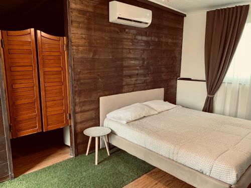 מיטה או מיטות בחדר ב-Cosi Priziusi