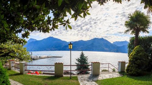 a view of a lake with mountains in the background at Miralago Casa in Menaggio