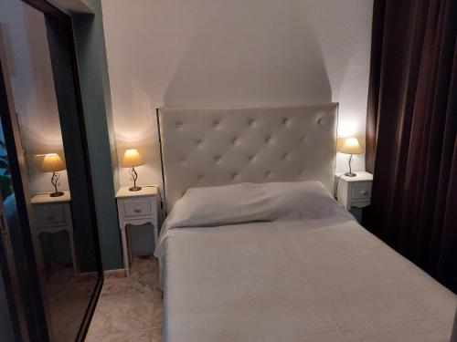 Ein Bett oder Betten in einem Zimmer der Unterkunft Excelsior II Vista