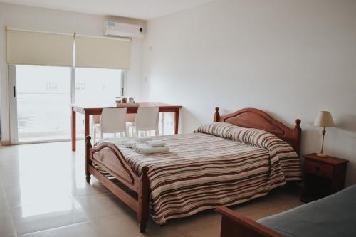 Postel nebo postele na pokoji v ubytování URUGUAY 27 - Cochera disponible a requerir