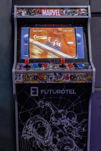 a video game machine with a marvellous picture on it at Futurotel Malagueta Beach in Málaga