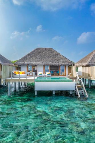 a villa on the water in the maldives at Dusit Thani Maldives - 50 percent discount on transfers for stays until 20 Dec 2025 in Baa Atoll