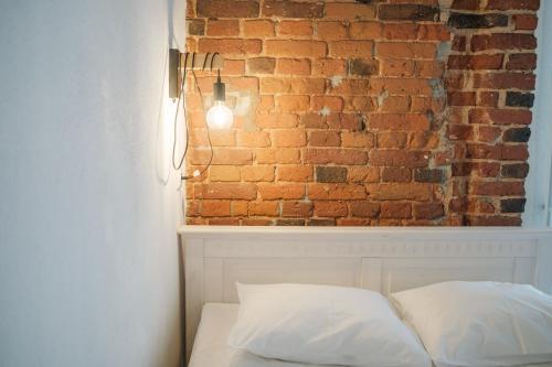Katil atau katil-katil dalam bilik di Filosoofi 1 Studio Apartments