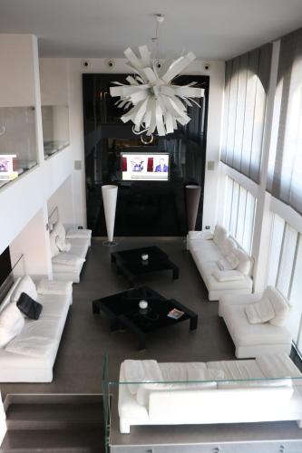 Posezení v ubytování HOTEL QUADRIFOGLIO