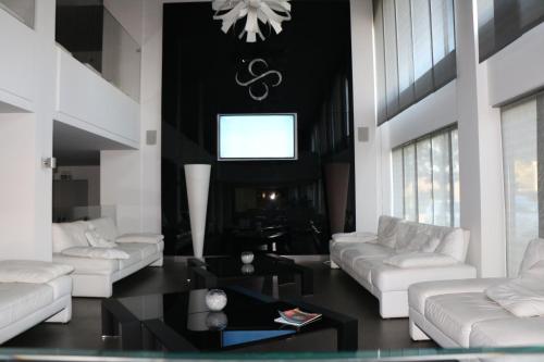 Posezení v ubytování HOTEL QUADRIFOGLIO