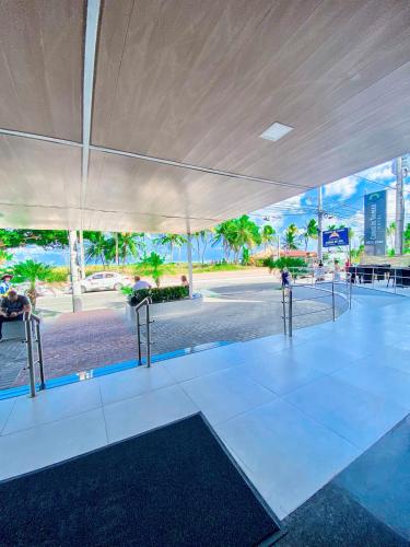 a large white tent with a view of the ocean at Beira Mar Imperial Flat 612 in João Pessoa