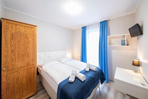 Katil atau katil-katil dalam bilik di Hotel Nowa Panorama
