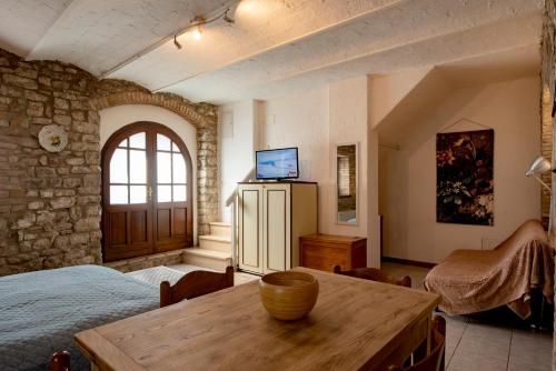 Postel nebo postele na pokoji v ubytování CASA NEL BORGO