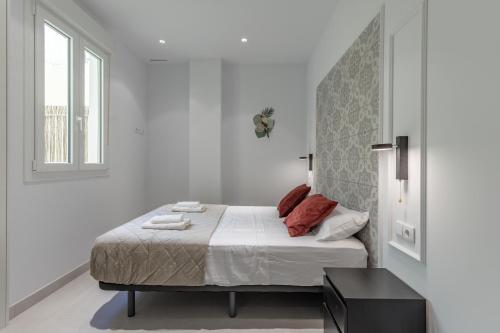 Ένα ή περισσότερα κρεβάτια σε δωμάτιο στο Chic & Comfortable Apartment, Private Terrace
