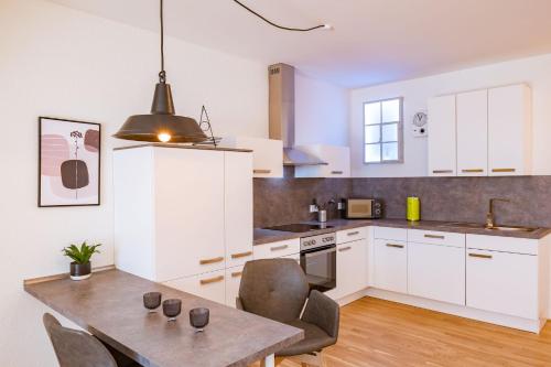 Dapur atau dapur kecil di Moderne Neubauwohnung bei Köln