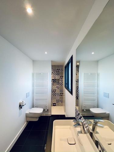 Ένα μπάνιο στο Chambres d'hôtes Ty Embruns