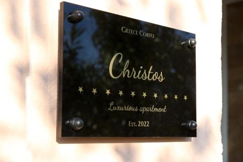 a sign that says christmas with stars on it at Luxury Apartments Christos in Gouvia