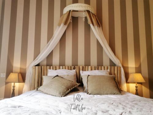 En eller flere senger på et rom på Villa Font Vive - Chambres d'hôtes éco-labellisées avec cuisine - Top confort, calme absolu et vue exceptionnelle !