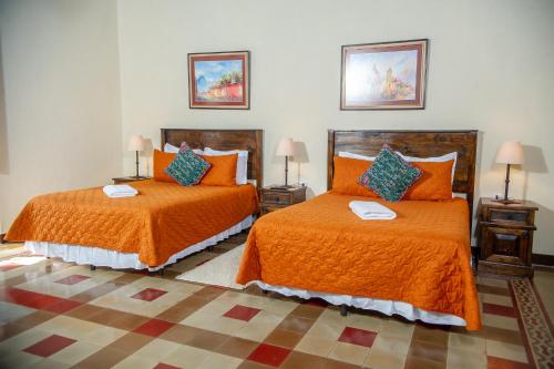 Ένα ή περισσότερα κρεβάτια σε δωμάτιο στο Hotel Convento Santa Catalina by AHS