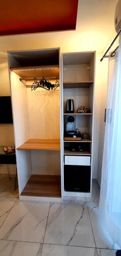 Kuchyň nebo kuchyňský kout v ubytování Ercolano Luxury Suite