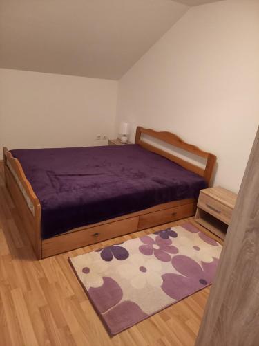 Postel nebo postele na pokoji v ubytování Apartman Giovanni