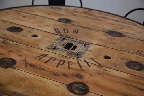 a wooden box with the words born imperial on it at CYRIS - Chambres Duplex climatisées - Spa & Piscine Centre ville in Saint-Germain-des-Fossés