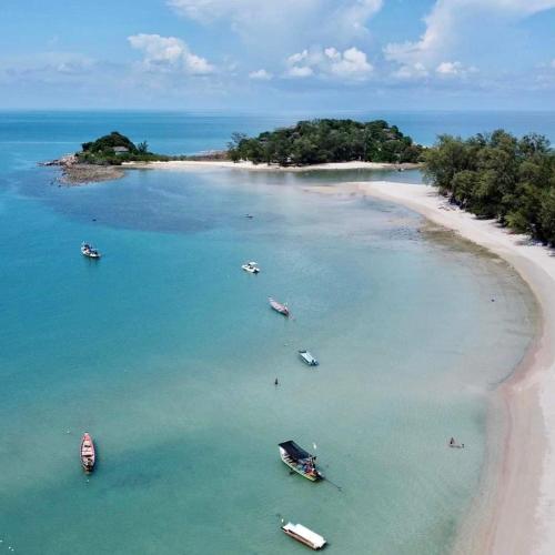 an aerial view of a beach with boats in the water at Moon Cottage in Choeng Mon Beach