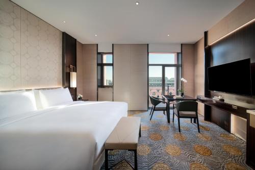 โทรทัศน์และ/หรือระบบความบันเทิงของ Beijing Hotel NUO Forbidden City