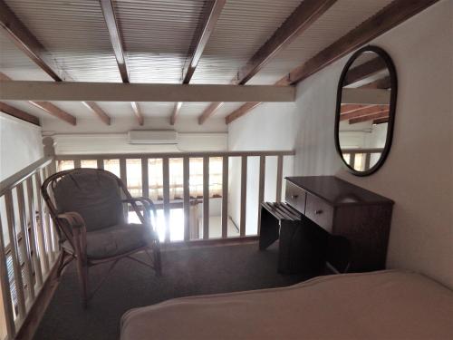 Ένα ή περισσότερα κρεβάτια σε δωμάτιο στο Hotel Pilalidis