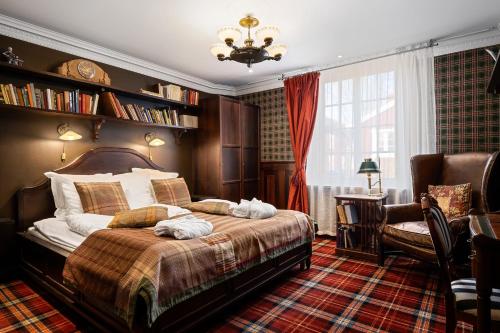 Postel nebo postele na pokoji v ubytování Häringe Slott
