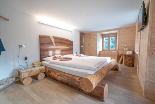 Postel nebo postele na pokoji v ubytování Hotel Wasserfall