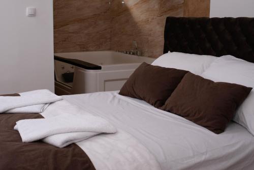 Ένα ή περισσότερα κρεβάτια σε δωμάτιο στο Sobe i Apartmani Casa Mia