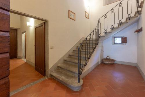 a hallway with a staircase in a house at Agriturismo I Bonsi in Reggello