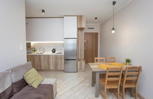 Kuchyňa alebo kuchynka v ubytovaní Urban Jungle - Lara Apartment