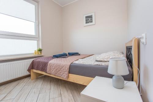 Posteľ alebo postele v izbe v ubytovaní Urban Jungle - Lara Apartment