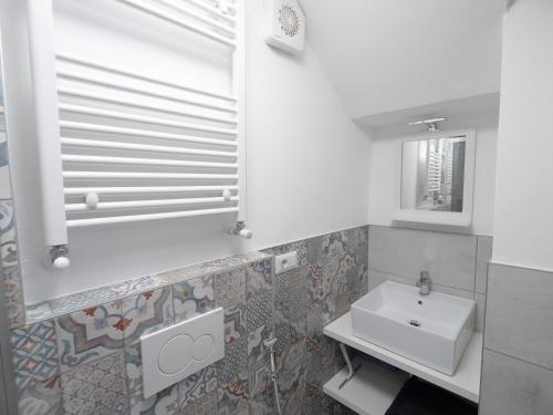 Vonios kambarys apgyvendinimo įstaigoje Bellano Holidays - Casa Ortensia