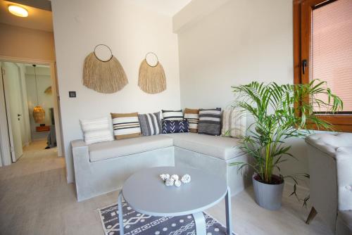 Χώρος καθιστικού στο Alp Suites Mandalin