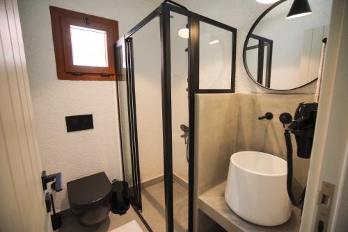Ένα μπάνιο στο Alp Suites Mandalin