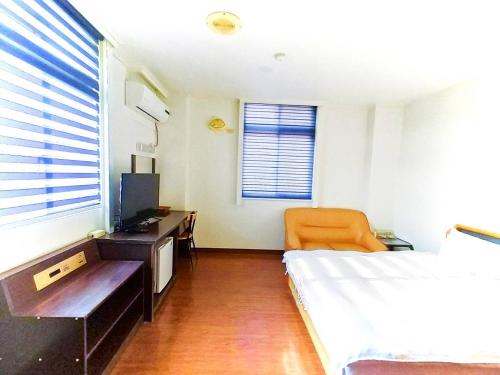 Μια τηλεόραση ή/και κέντρο ψυχαγωγίας στο Royal Business Hotel
