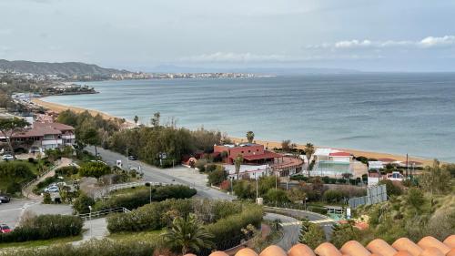 an aerial view of a town and the ocean at Belvedere Lacinio -Casa Vacanze- in Crotone